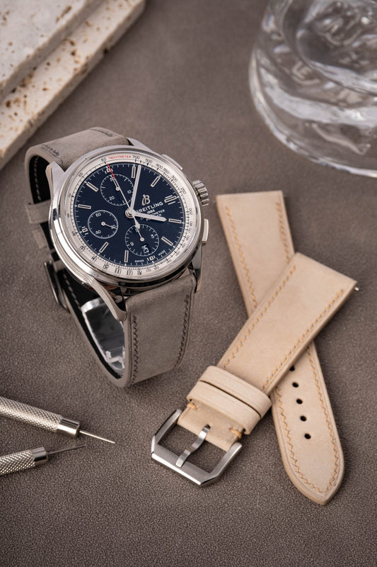 Handcrafted nubuck-textured calfskin quick-release watch strap, compatible with Breitling Navitimer, Rolex Submariner & Omega Speedmaster. 2.0mm spring bars fit 20-22mm lugs, 3.5mm French edge stitching. Custom engraving/stitch color/length options for refined casual styling.