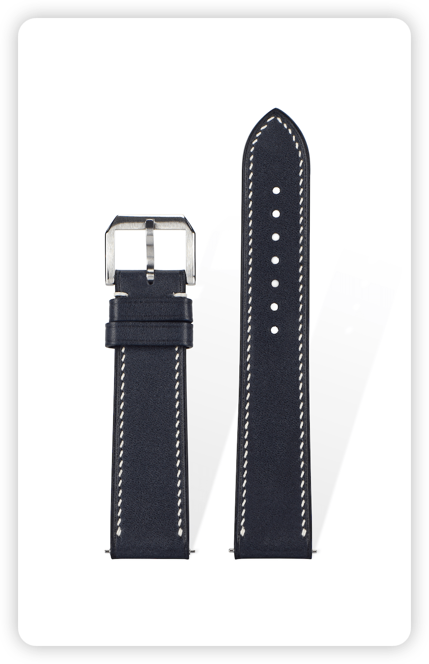 Handcrafted Barenia light brown leather strap in Denim Blue, quick-release spring bars compatible with 20mm Rolex lugs, French vegetable-tanned with dual-hole reinforcement.