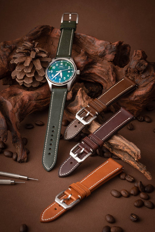 Handcrafted matte calfskin quick-release straps compatible with Omega Seamaster 300, Rolex Submariner & Panerai Luminor. 6 colors (espresso/gunmetal/ivory), 2.0mm spring bars fit 20-22mm lugs, 3.5mm French edge stitching. Custom length/stitch color/metal engraving for refined casual styling.